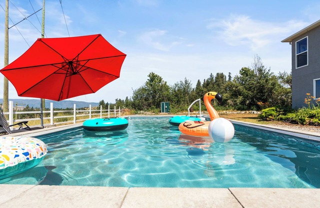 Spacious family home surrounded by mountains, orchards and walking trails.