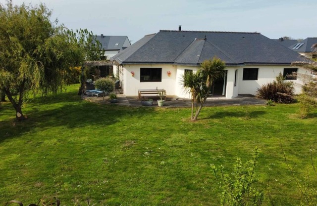 Spacious house with garden, pets welcome.
