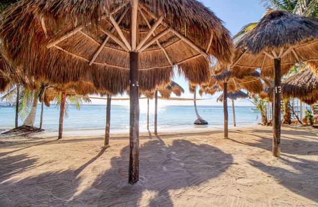 Spanish-style home with pool, W/D, 2 living areas & 2 kitchenettes - near beach