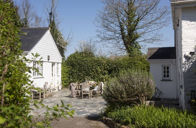 Sparnal Stitch and Annexe nestled in the trees, just moments from sandy beaches