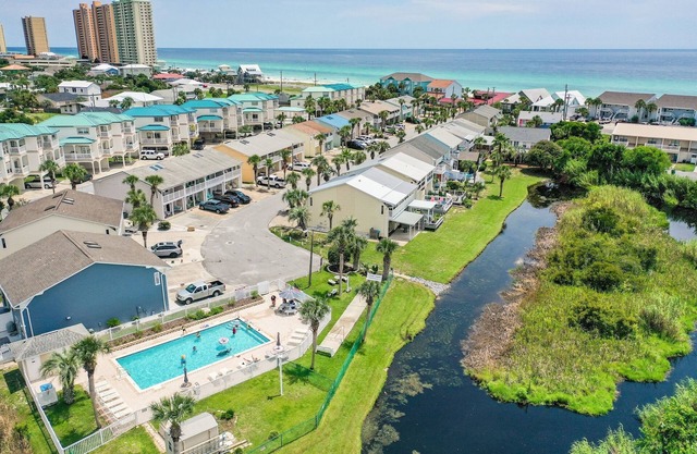 STEPS to Beach! 2B/2B, Sleeps 9! Beach, POOL, Repeat! NEW! Grill! Wagon!