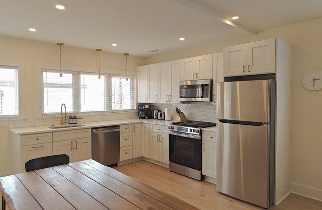 Steps to THE Beach – 3 BDR Condo + Parking