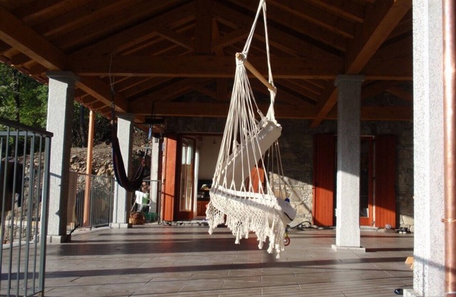 Stone house with 5 beds, large covered terrace with lake view.