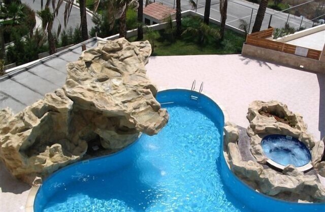 Stunning 2 bedroom luxury apartment, fantastic views, amazing pool and gardens