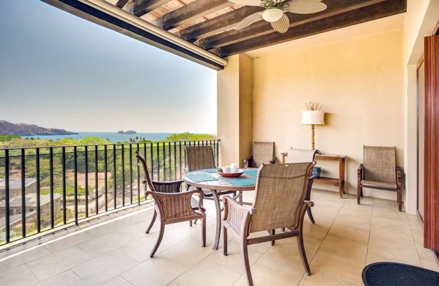 Stunning coastal penthouse with sweeping views, pools, gym, fast WiFi & AC