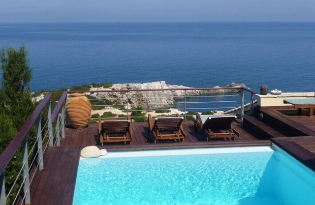 Stunning Villa in an amazing setting above the beach. Stunning sunsets assured.
