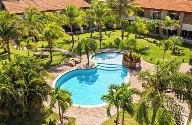 Stylish 3BR Condo, 1 Min to Eagle Beach, Pool, Gym, BBQ & Mini Market 1 Min Away