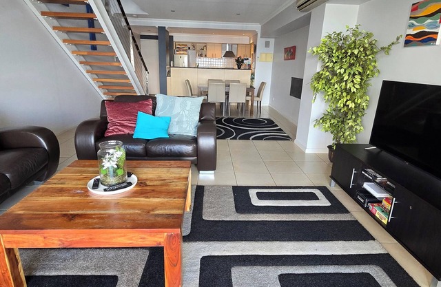 Stylish haven at One8 Waterfront Apartment