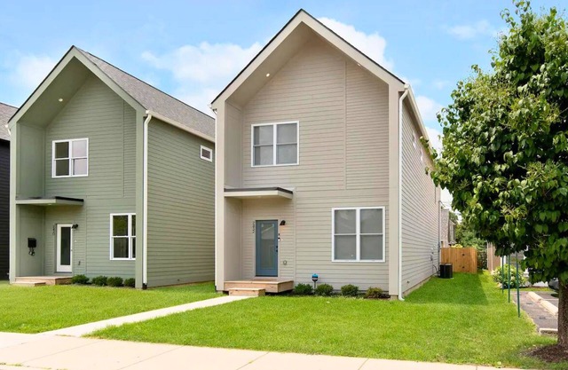 Stylish Oasis: 4BR, Hot Tub, Near Downtown