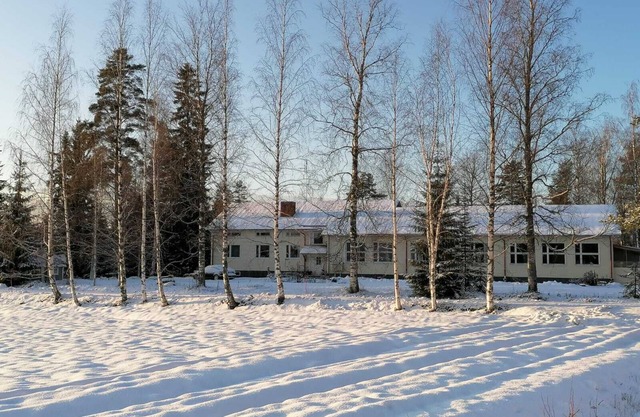 Summer Hill is a apartment in a former school with a big yard a lake nearby.