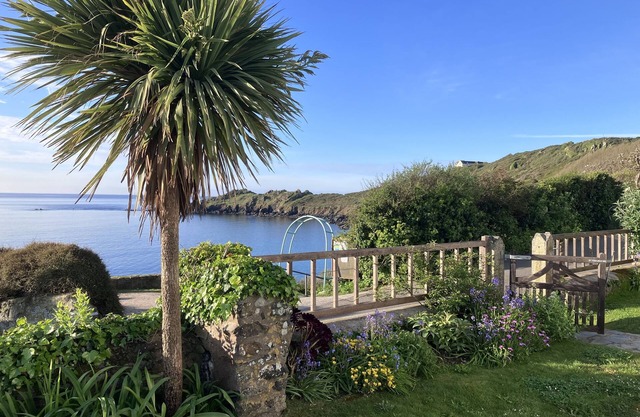 Superb sea views. Private off-road parking. Fenced garden. Spacious,light,airy.