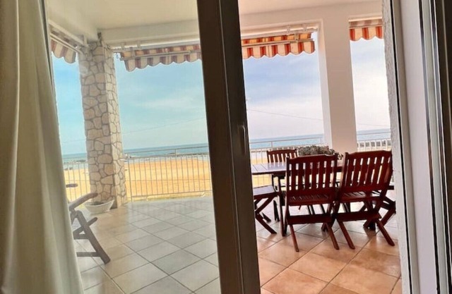Terrace with sunrise view. 1 minute walk to the beach. A/C