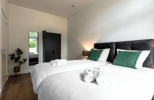 The apartment features one luxuriously appointed bedroom.