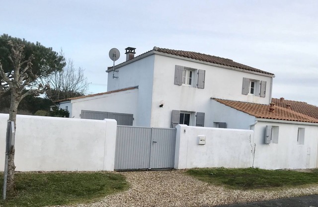 The white and gray house is waiting for you
