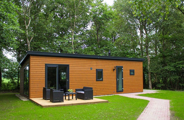 This cozy furnished vacation home is located in a beautifully landscaped vacation park, the centerpi