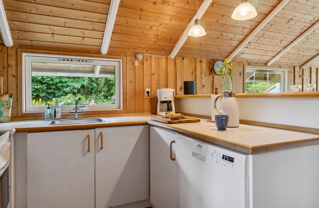 This cozy vacation home awaits you near the Roskilde fjord shore.