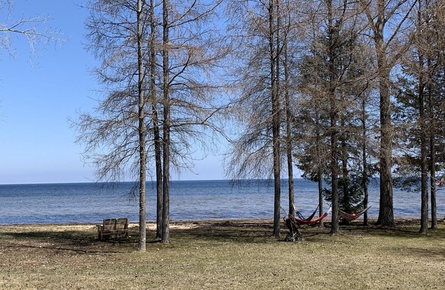 Three Bedroom House on 10 acres with 350 ft. Sand Beach on Lake Michigan.