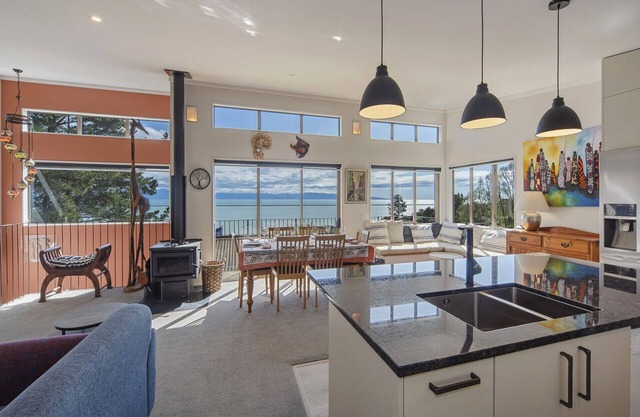 Three-story home providing every room with Sea views and all-day sun