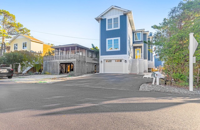 Town of Bethany Beach home with a fireplace & outdoor living - near beach