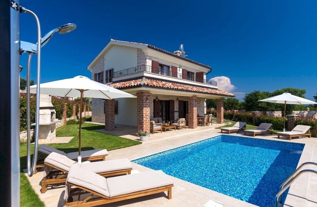 Traditional style Villa Suza* with an outdoor pool on Krk