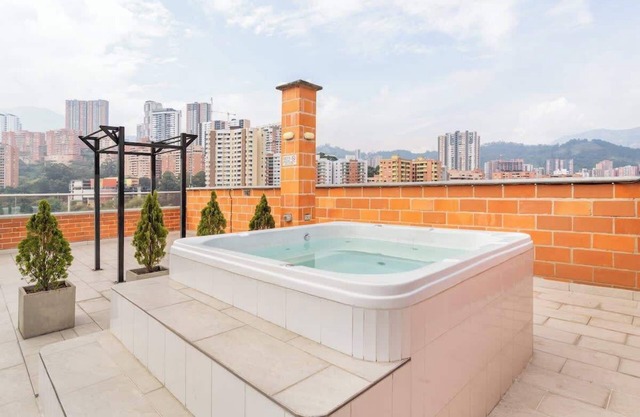 Triple Apts: 9BR, 6BA by Medellín, Dining, Nightlife, Fast Wifi & Self Check-in