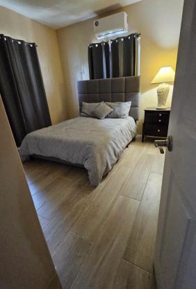 Tulu Famaguon Newly Renovated 2 BR 1BA Entire Apartment Free Wifi, Continental Breakfast, Parking