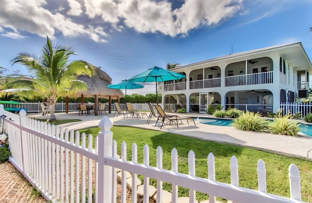 Turtle Time - Beautiful waterfront home with pool, dock and tropical landscaping