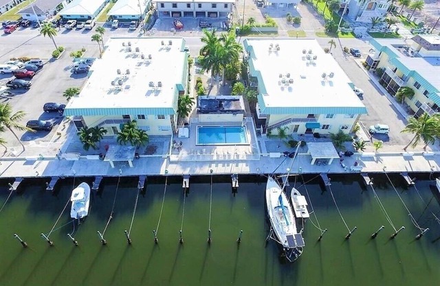 Turtles Nest. Amazing 2/2 with private ramp, boat slip, heated pool and more!