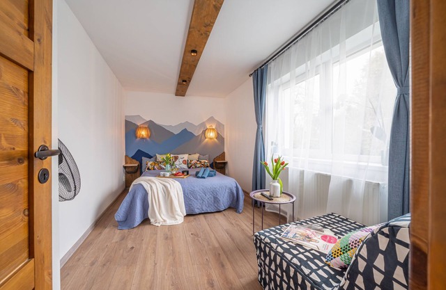 Two bedroom apartment great for family, with playground and free parking in yard