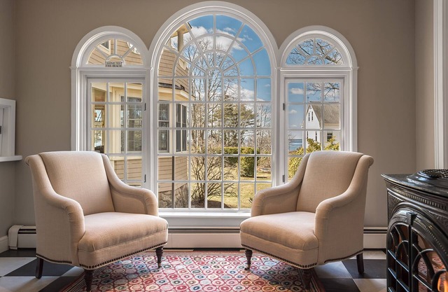 Two primary suites, ocean views and a large private yard