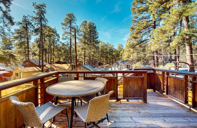Two-story home with sunroom, large yard, fire pit, & BBQ grill