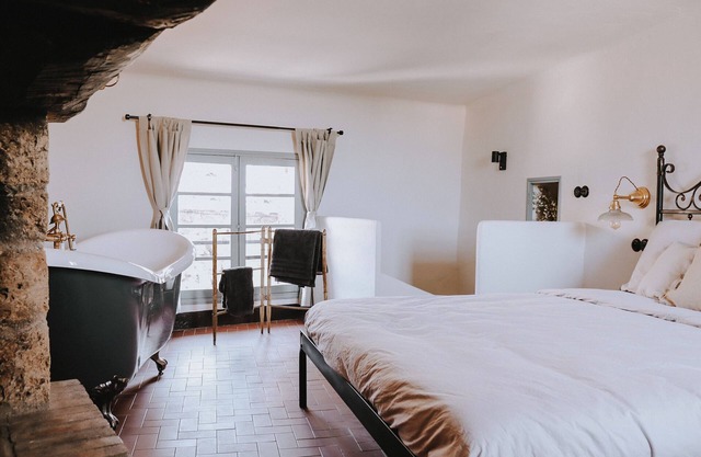 Unique historic house, middle of the village, bath & patio. 4 persons & pets
