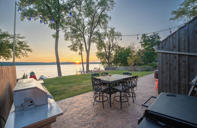 Unique riverfront home w/beach, dock, watersports, firepit, hot tub, and sauna!