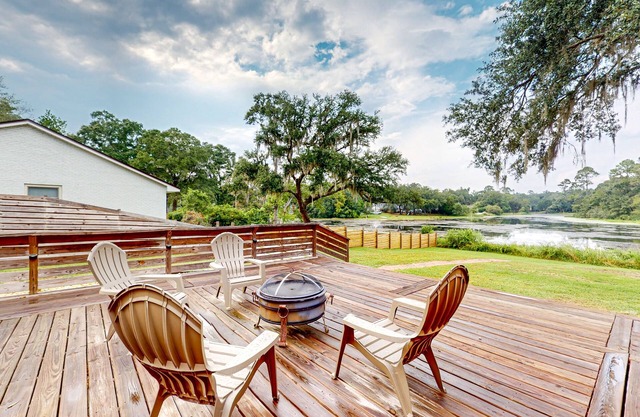 Updated waterfront home with spacious outdoor living area, gaming room