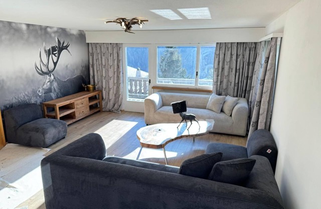 Vacation home with wellness area in alpine chic retro style