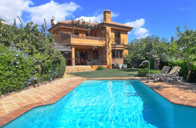 Very spacious family villa with large private heated pool & beautiful sea views
