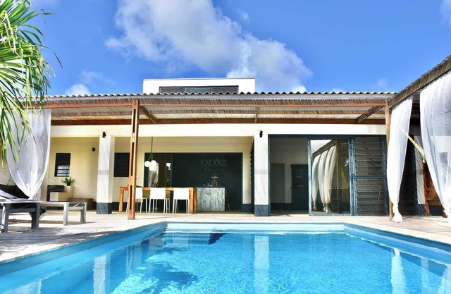 Villa Kas Kris with a tropical garden and a private magnesium pool