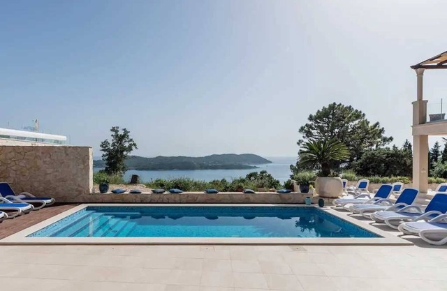 Villa Paradiso - luxury 7-bedroom villa with a heated pool and sea views