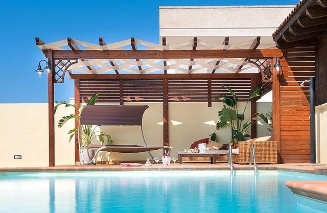 Villa Plutone: A cozy and welcoming villa situated in a quiet location, surrounded by a wonderful garden, with Free WI-FI.