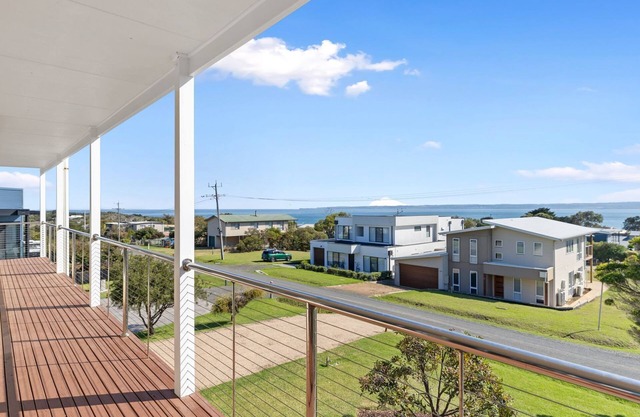 Wake up to panoramic ocean views every day in this beautifully designed coastal haven, where comfort