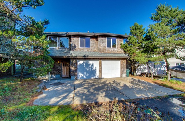 Walk to Oregon Coast Aquarium from this modern, dog-friendly, oceanview home