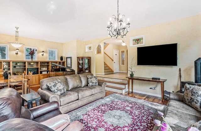 Walkable downtown villa with mountain/resort-view balconies, grills, & fireplace