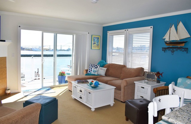 Watch The Newport Lighted Boat Parade From Our Deck! Dec. 6, 2025