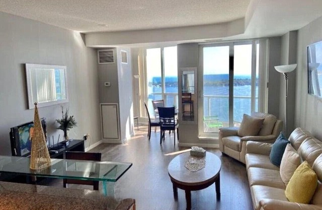 Waterfront 2 BR Condo, Pool, Gym, Parking & Views!