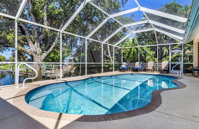 Waterfront Bliss with Heated Pool, Private Dock & Gulf Access – Lotus Cove