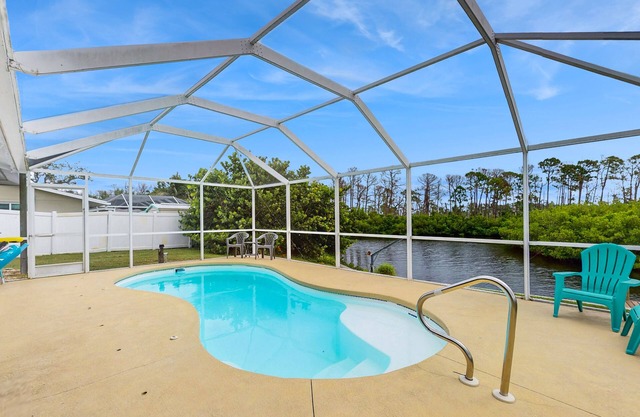 Waterfront & ground-floor home with free WiFi, dock, pool, & central AC