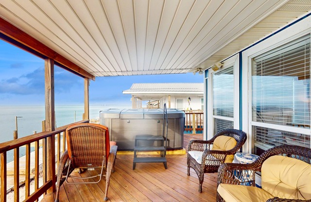 Waterfront home with bay & sound views, deck, grill, W/D, & AC