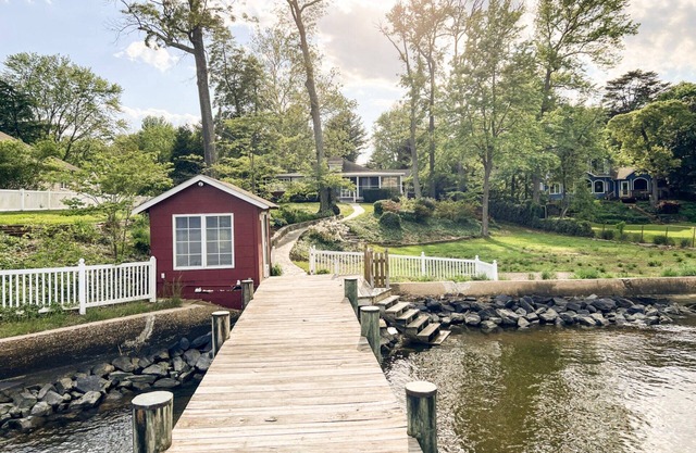 Waterfront River Breezes with private pier, parking and billiards room