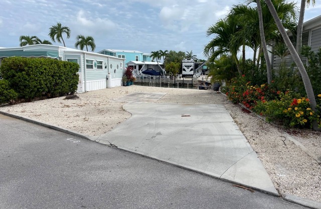 Waterfront RV Lot w 35' dock in "Venture Out". Utility hookups & beautiful views