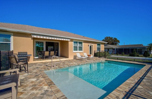 Your Serene Escape: Pool, Elegant 3BR Home with Gourmet Kitchen, Minutes to Dining and Shopping!